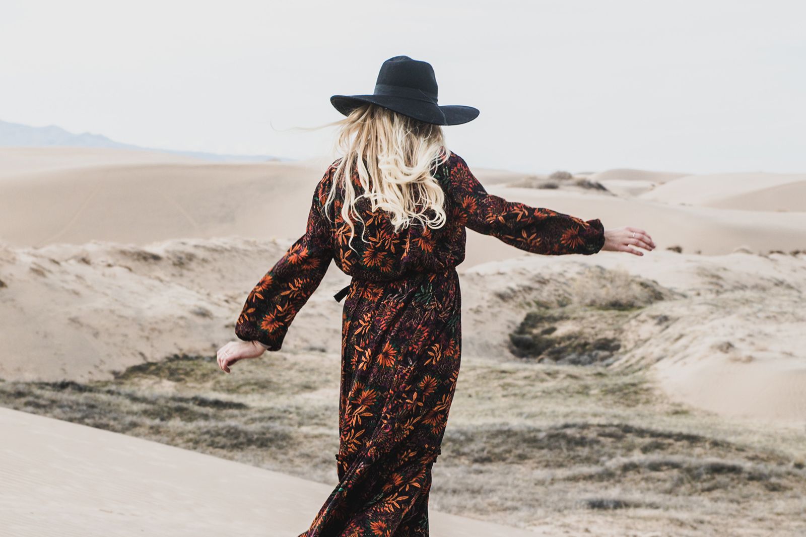 Woman Walking on Sand